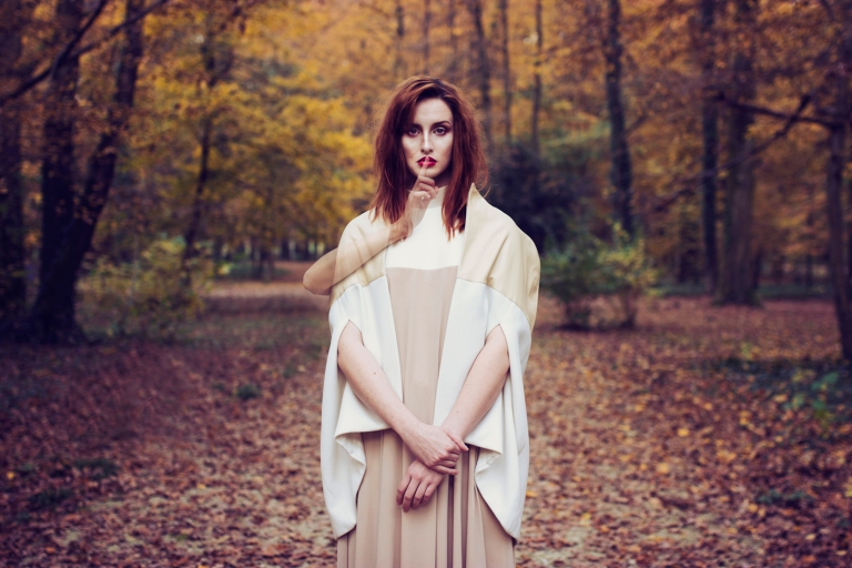 Ghost series conceptual photoshoot with girl in a dress in a park autumn